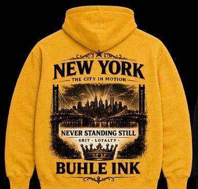 Loyalty "City in Motion" Hoodie with New York back graphic and gold detailing in oversized fit