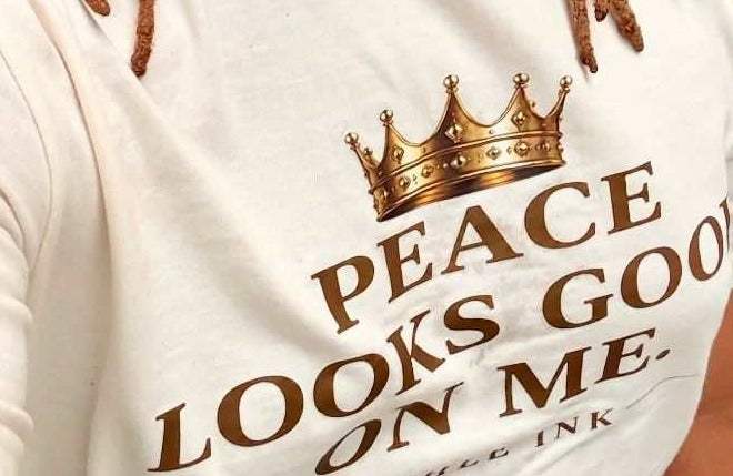 Peace Looks Good On Me Short Sleeve T-Shirt - close-up of the print on the garment - Buhle Ink Apparel